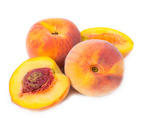 fresh peaches on white background