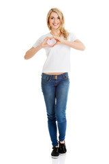 Woman with pink breast cancer awareness ribbon