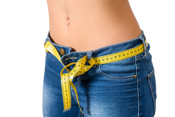 Young woman wearing jeans  after diet