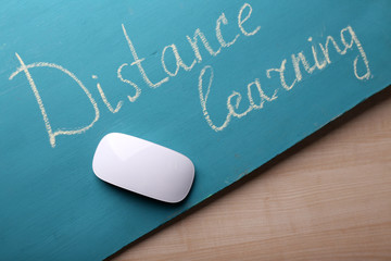 Computer mouse and inscription Distance Learning