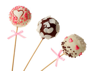 Tasty cake pops, isolated on white