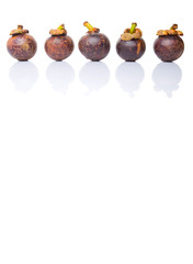 Ripe mangosteen fruit over white background