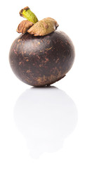 Ripe mangosteen fruit over white background
