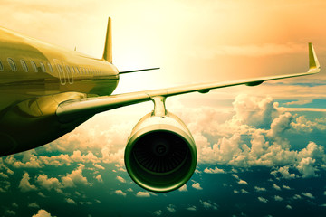 passenger jet plane flyin above cloud scape use for aircraft tra