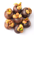 Ripe mangosteen fruit over white background