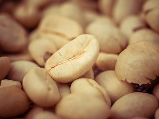 Fototapeta premium green coffee beans macro with filter effect retro vintage style