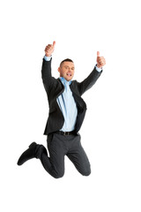 Happy businessman jumping