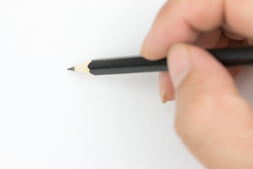 Holding a pencil sketch