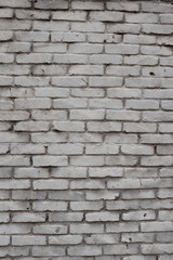 Mur de briques peint en blanc