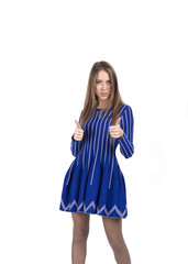 Lady in blue dress makes okay gesture with both hands