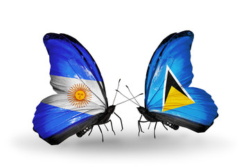 Two butterflies with flags Argentina and Saint Lucia