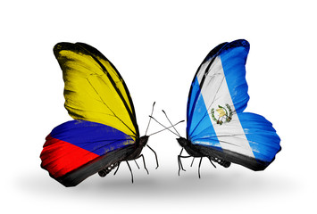 Two butterflies with flags Columbia and Guatemala