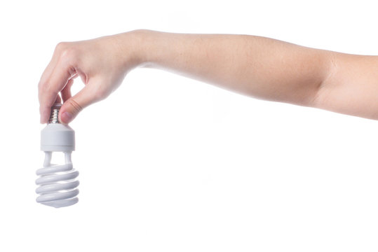 hand with energy saving lamp on white background