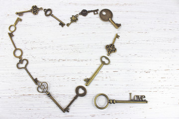 Heart shape made with old antique keys. Valentines day concept
