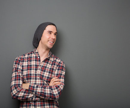Cheerful young man in checkered shirt