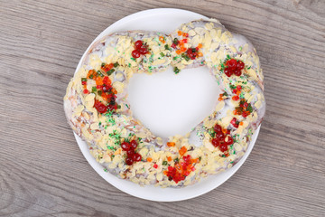 Pretzel with almonds and colored jelly