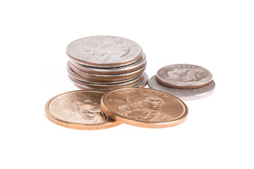 Pile of US coins isolated on white background