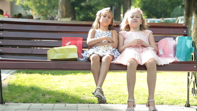 Cute fashion little girls in summer dresses