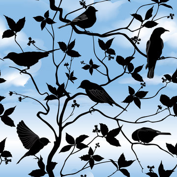 birds in sky background. silhouette seamless floral  pattern