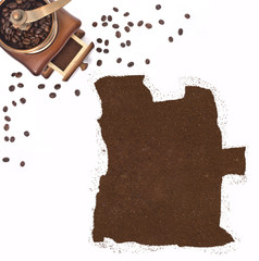 Coffee powder in the shape of Angola and a coffee mill.(series)