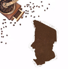 Coffee powder in the shape of Chad and a coffee mill.(series)