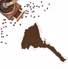 Coffee powder in the shape of Eritrea and a coffee mill.(series)
