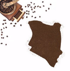 Coffee powder in the shape of Kenya and a coffee mill.(series)