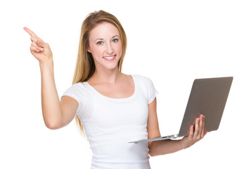 Woman use of laptop and finger point up