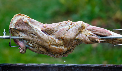 Leg of a small lamb on a spit © psvrusso