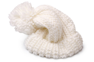 Warm woolen knitted hat with pompon