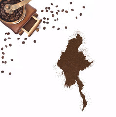 Coffee powder in the shape of Burma and a coffee mill.(series)