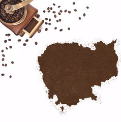 Coffee powder in the shape of Cambodia and a coffee mill.(series