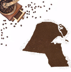 Coffee powder in the shape of Kuwait and a coffee mill.(series)