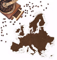 Coffee powder in the shape of Europe and a coffee mill.(series)