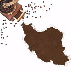 Coffee powder in the shape of Iran and a coffee mill.(series)