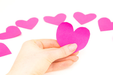 female hand holding a valentine