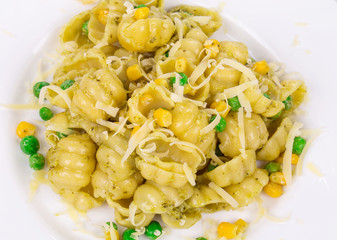 Pasta with cheese and pesto.