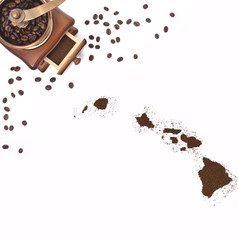 Coffee powder in the shape of Hawaii and a coffee mill.(series)