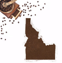 Coffee powder in the shape of Idaho and a coffee mill.(series)