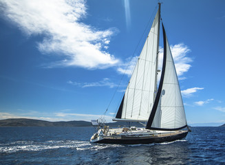 Fototapeta na wymiar Sailing. Boat in sailing regatta. Luxury yachts.