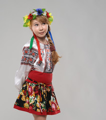  red-haired girl in Slavic national costume dreams
