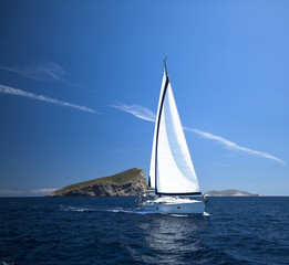 Fototapeta na wymiar Sailing boat in the sea. Luxury Yachts.