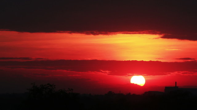 time lapse of sunset or sunrise (reverse).