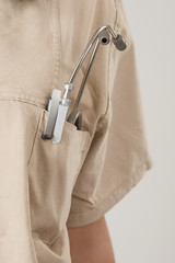 Fragmental Closeup of Female Medical Uniform With Endoscope in P