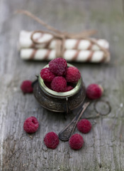 frozen raspberries old wooden background retro vintage