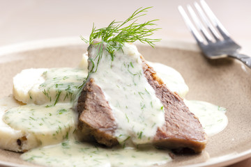 dill sauce with beef meat