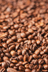 Closeup Background Made of Heap of Roasted Coffee Beans.