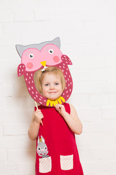 Little Girls Holding Owl Mask On White Background