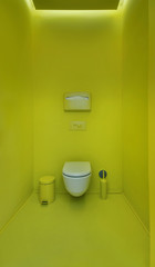 Public toilet in a modern loft style. Minimalism, toilet, brush,