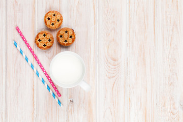 Fototapeta na wymiar Cup of milk and cookies